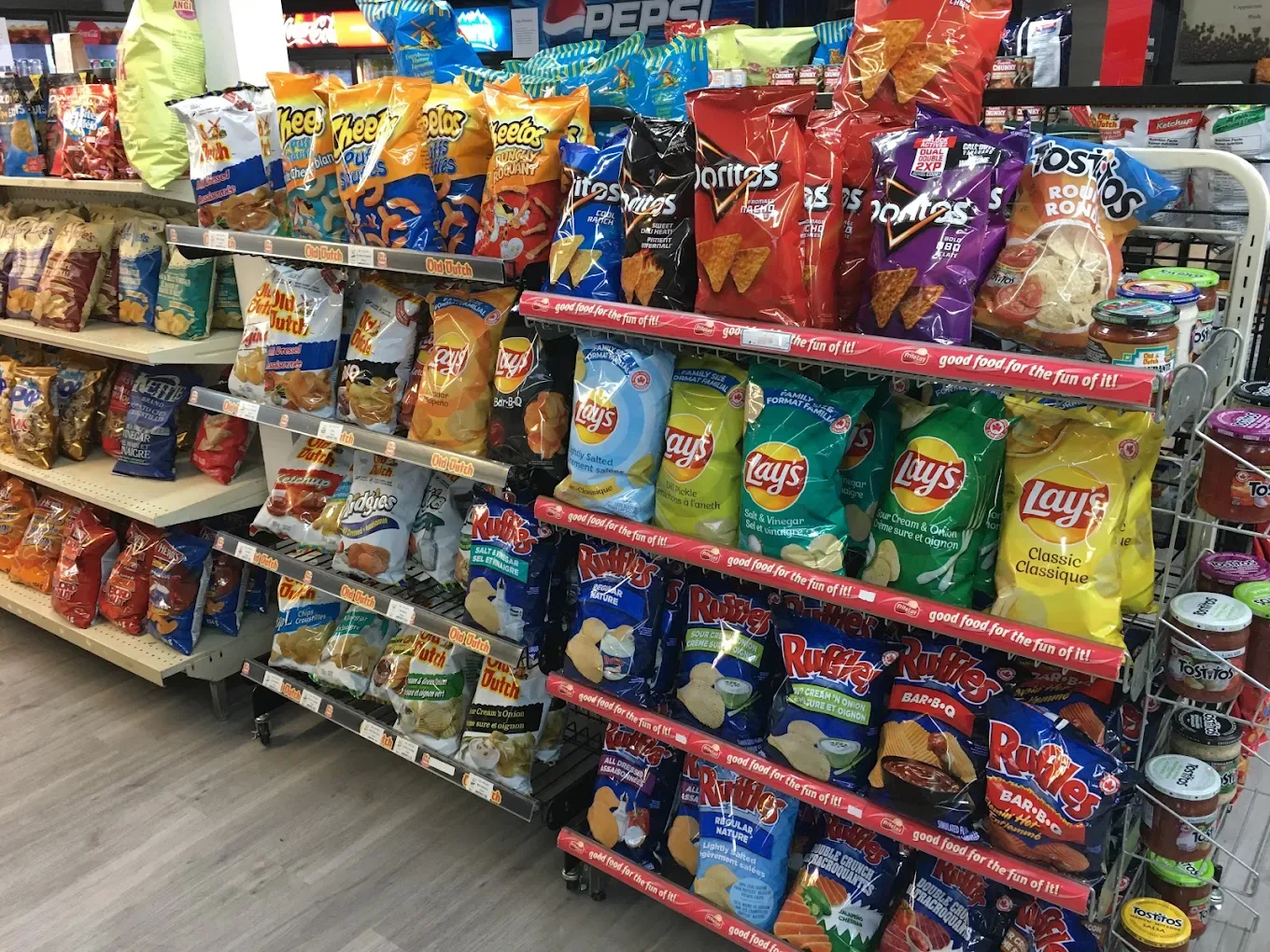 Salty snacks and dips at Northmount Convenience Store